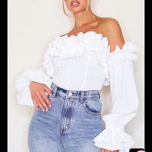 Pretty Little Thing White Ruffle Hem Off Shoulder Long Sleeve Top